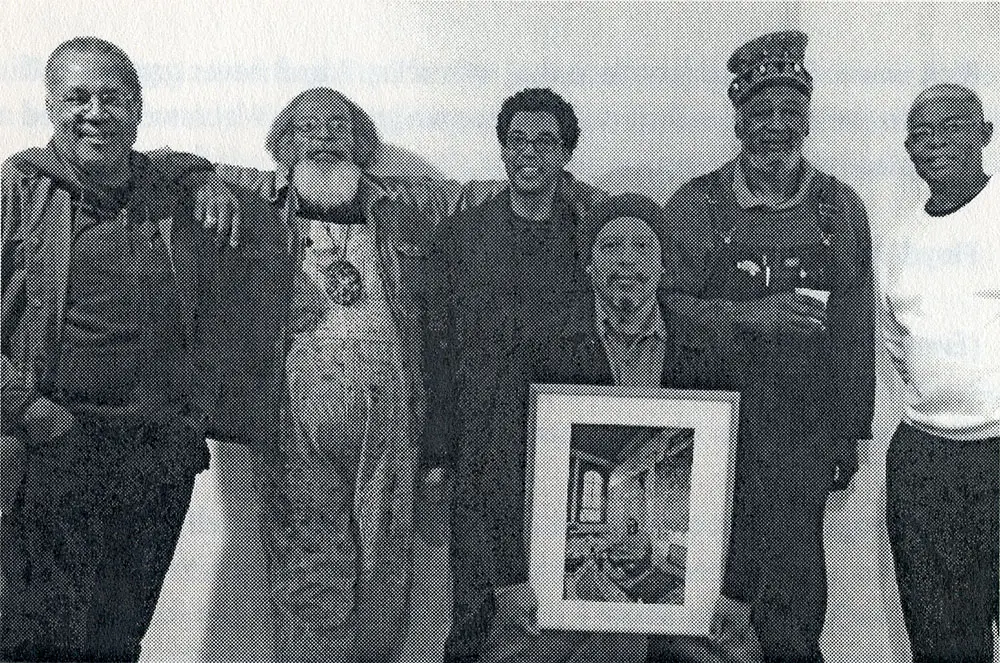 From left: Project Row Houses co-founders George Smith, Bert Long, Jr., Rick Lowe, Bert Samples (holding a framed photo of the late James Bettison), Jesse Lott, and Floyd Newsum. (Courtesy Project Row Houses, Houston)