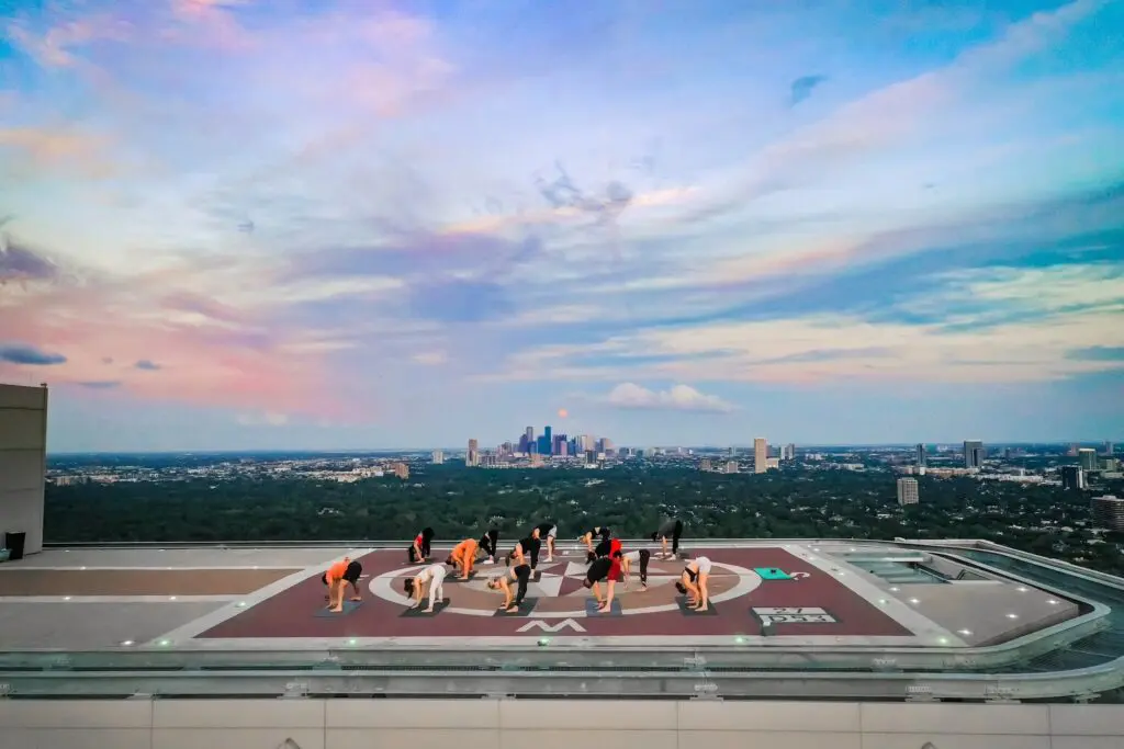 Indulge in an exclusive opportunity to witness the breathtaking Houston skyline with The Post Oak Hotel’s private Sunrise Yoga sessions.
