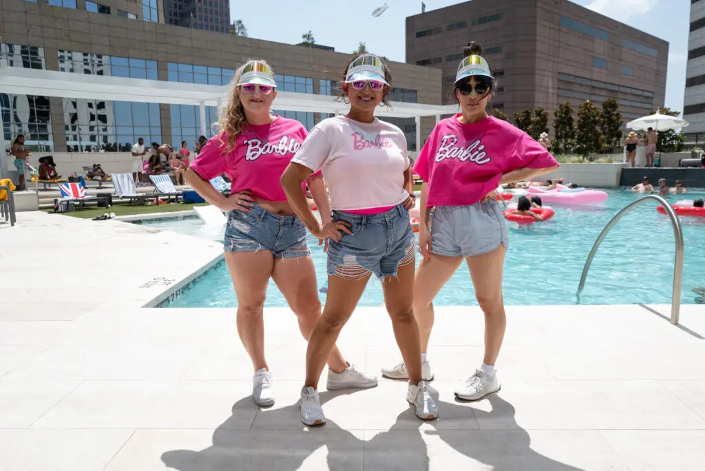 Suzy Roberman, Angelo Quin, Christina Chang at the Barbie-inspired pool party at Brava, the downtown residential high rise.