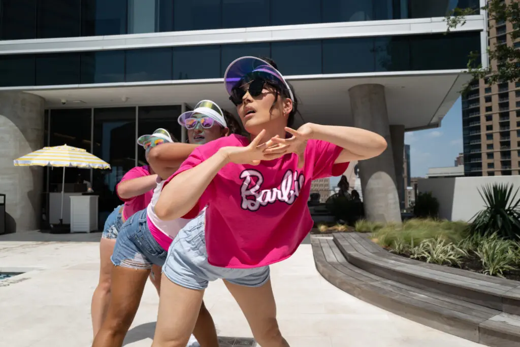 Suzy Roberman, Angelo Quin, Christina Chang at the Barbie-inspired pool party at Brava, the downtown residential high rise.