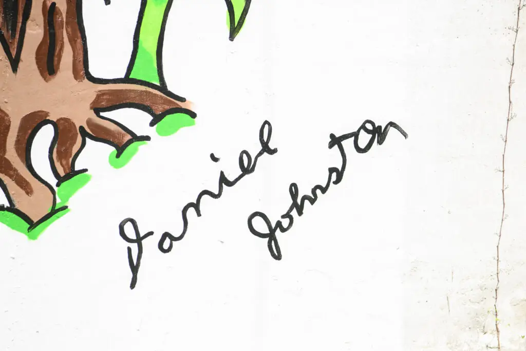 Recreation of Daniel Johnston's signature on the "Don't Be Scared" mural at Redbud Arts Center (Photo by Saranna Zhang/Kevin Zhang Photography)