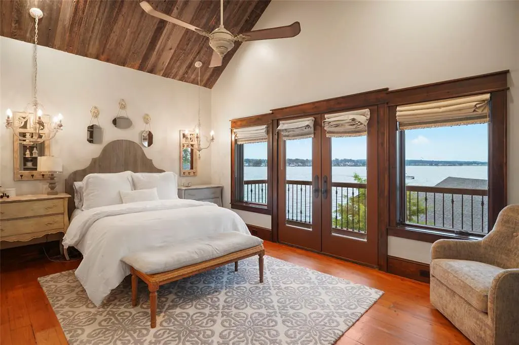 Bedrooms have a view overlooking Lake Conroe in the home at 9144 Escondido Drive.  (Photo by EmoMedia/Compass)