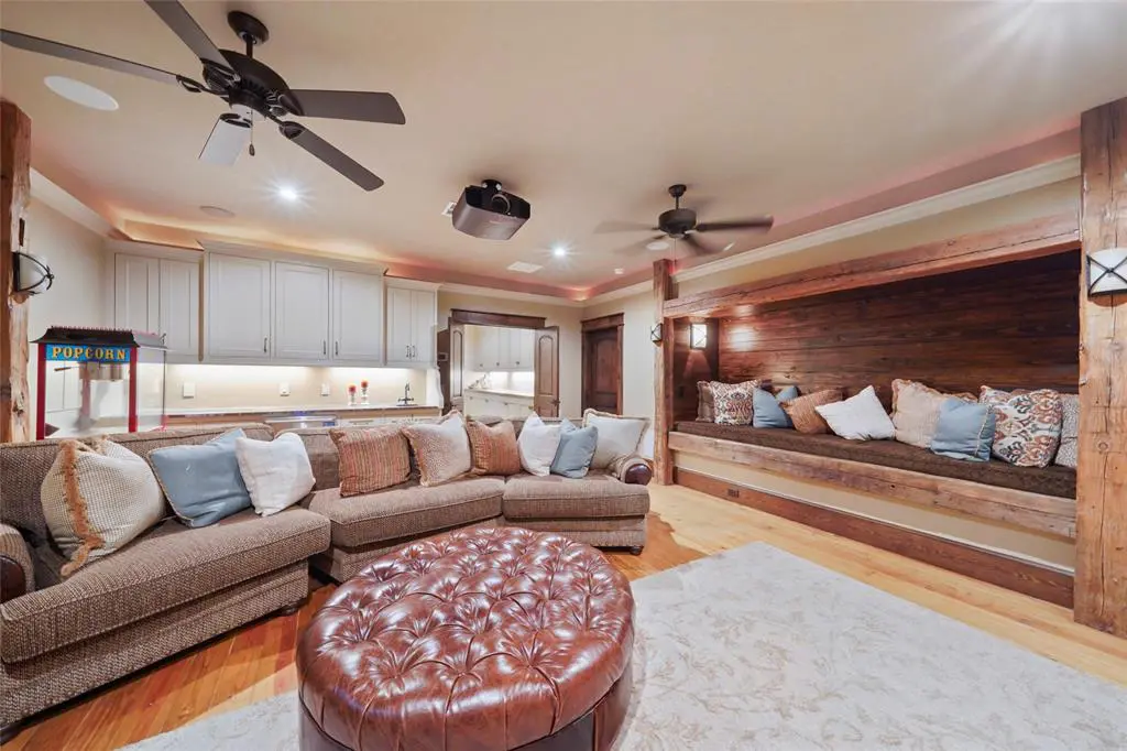 The second floor media room at 9144 Escondido Drive on Lake Conroe. (Photo by EmoMedia/Compass)