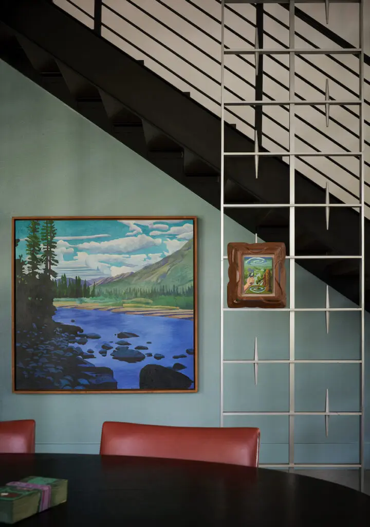 In the stairwell, grillwork from the Mercantile
Bank Building. Small painting by Rubén Torres, Barcelona. Billy Hassell painting, Conduit Gallery.  (Photo by Pär Bengtsson)