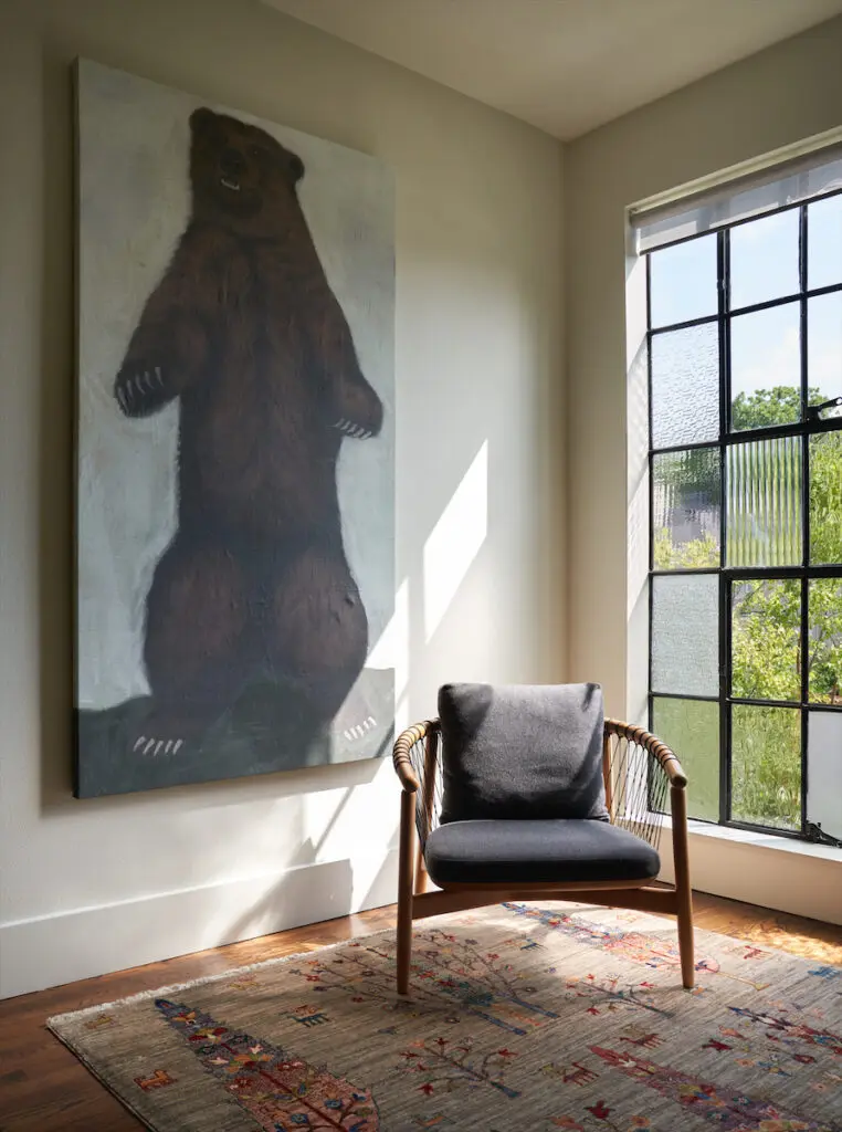Painting purchased from a fair in Palm Springs. Restoration Hardware chair. (Photo by Pär Bengtsson)