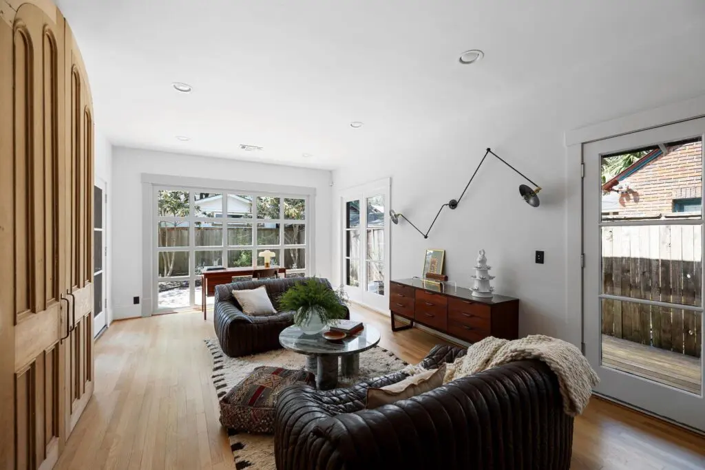 The light-filled living room at 1635 Hawthorne in Houston's Montrose neighborhood. (Photo by Josh Gremillion for Martha Turner Sotheby's International Realty )