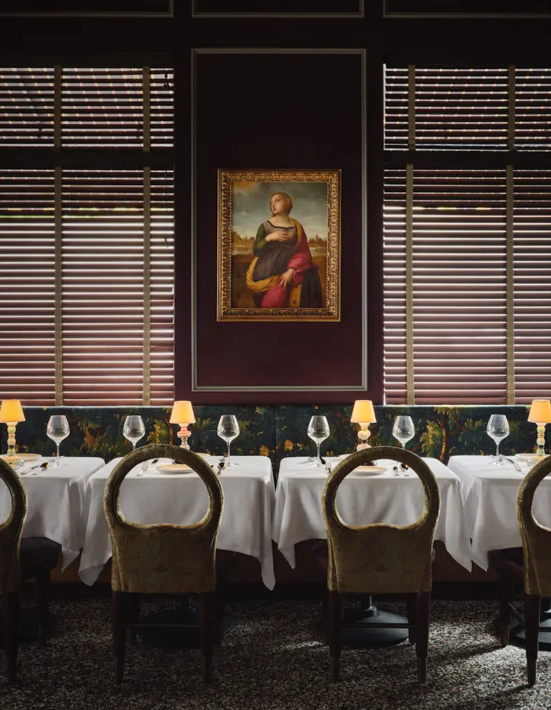 Banquette seating at Mister Charles. (Photo by Douglas Friedman)