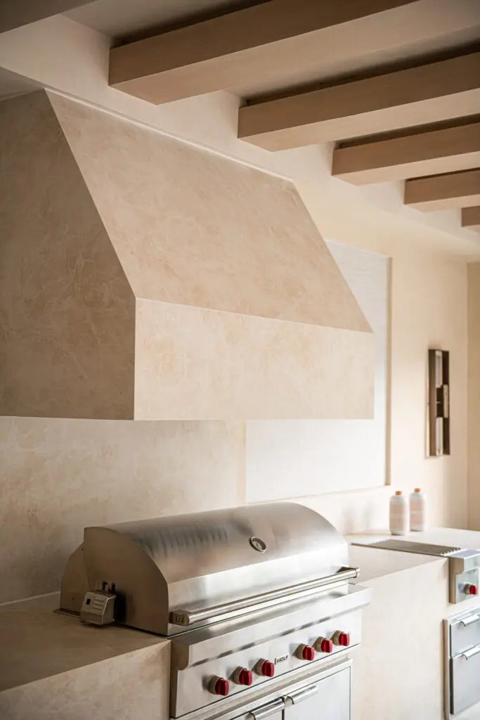 Whether you're cooking inside or outside, top of the line appliances abound throughout the home.
