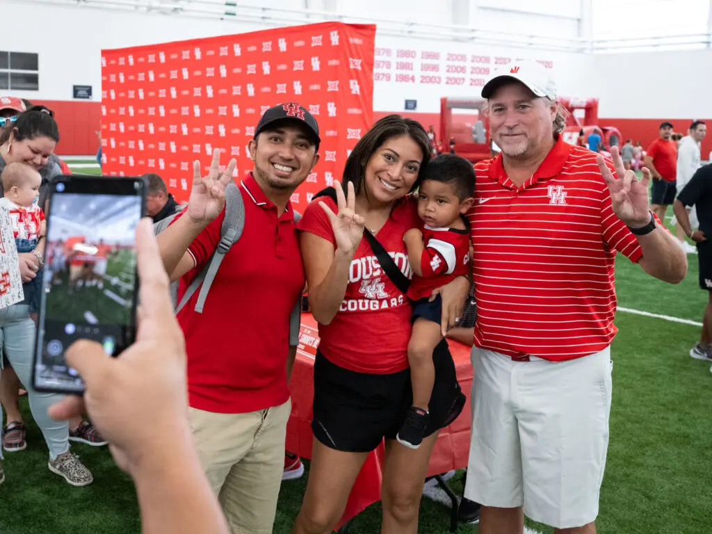 Who says University of Houston football coach Dana Holgorsen isn't fan friendly? (Photo by F. Carter Smith) 