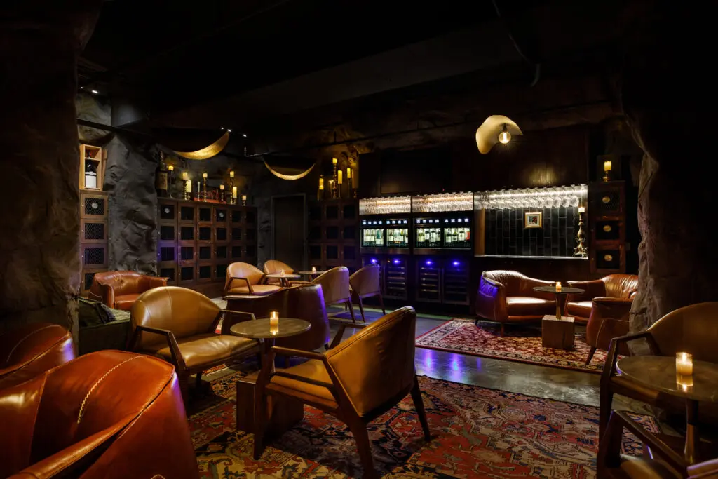 Cave Society is a private speakeasy setting with a selection of wines to sample in small pours.