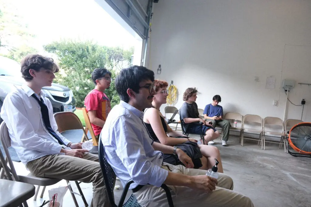 The cast and directors behind "The Garage," watching during rehearsals of "Sweet Trip" (Photo by Saranna Zhang)