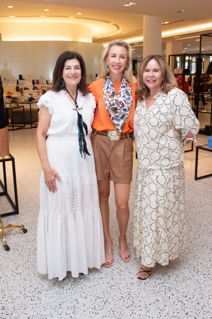 Ellie Francisco, Cathy Herr, Cyndy Garza Roberts at the Tootsies salute to Pat Mann Phillips, Houston Rodeo's first female board chair. (Photo by Jacob Power)