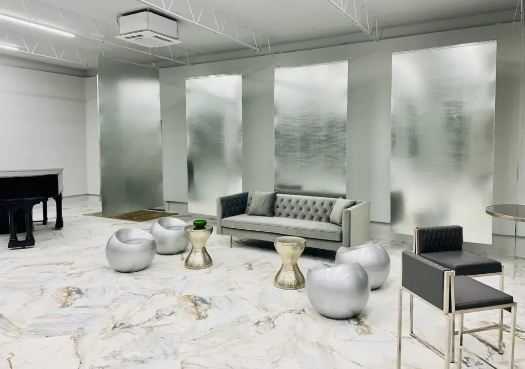 House of NeVille - Rotating artworks will hang against floating galvanized sheets of steel. (Photo by Courtney Dabney)