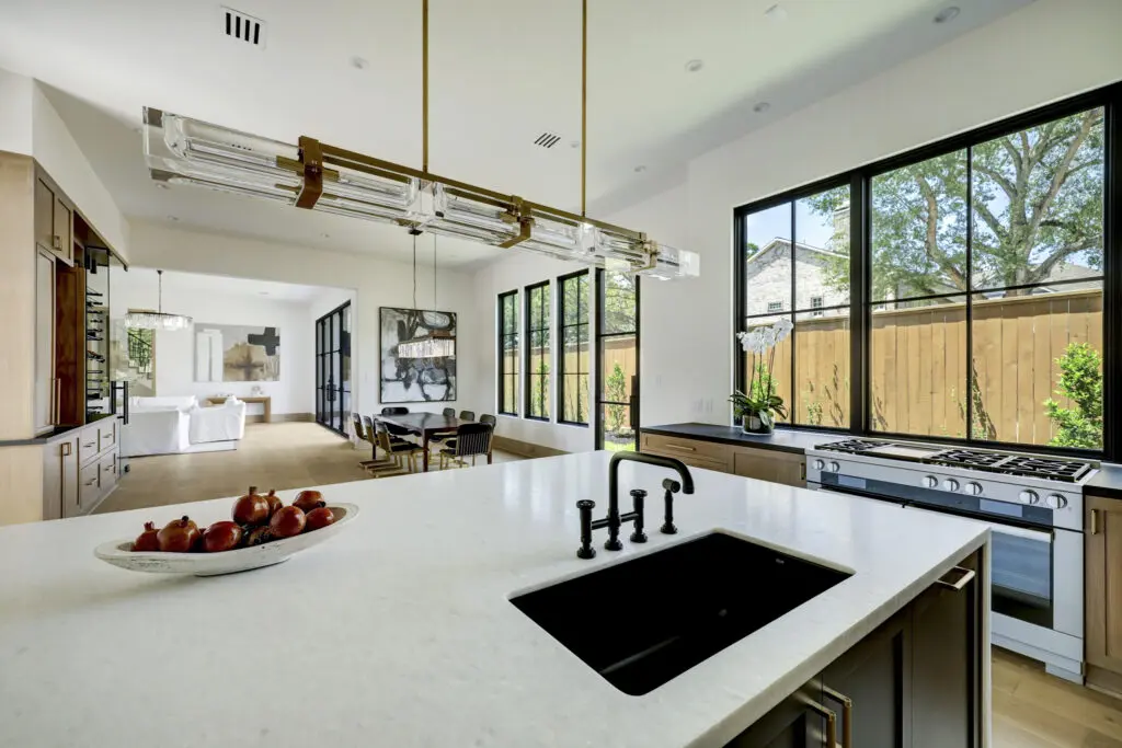 A bounty of windows provide ample lighting for the home at 3628 Locke Lane. (Photo by TK Images for Compass)