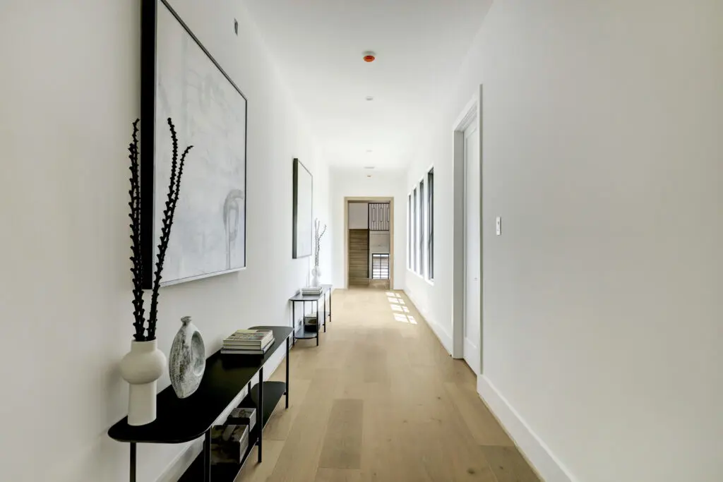 The upstairs hallway at 3628 Locke Lane. (Photo by TK Images for Compass)