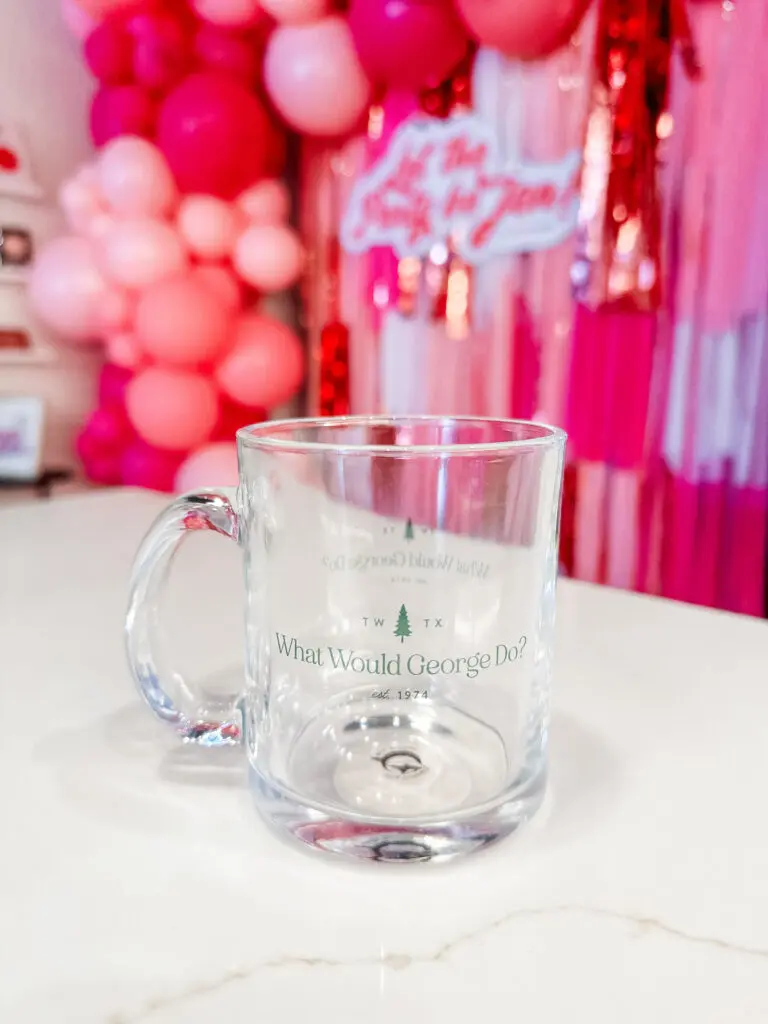 Woodlands-inspired merchandise - like this  What would George do (as in Mitchell) mug — is available at Jen Loves Paper. (Photo by Jen McDonald)