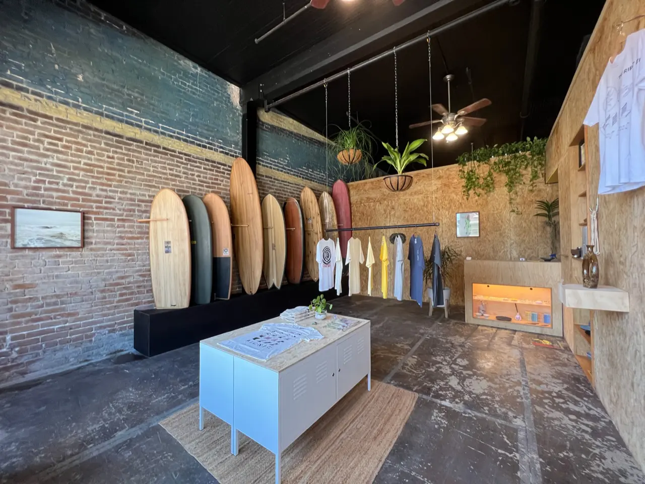 The PICNIC SURF SHAPES shop in Galveston brings unique surfboards made by Greg Ruppe and PICNIC brand merchandise.