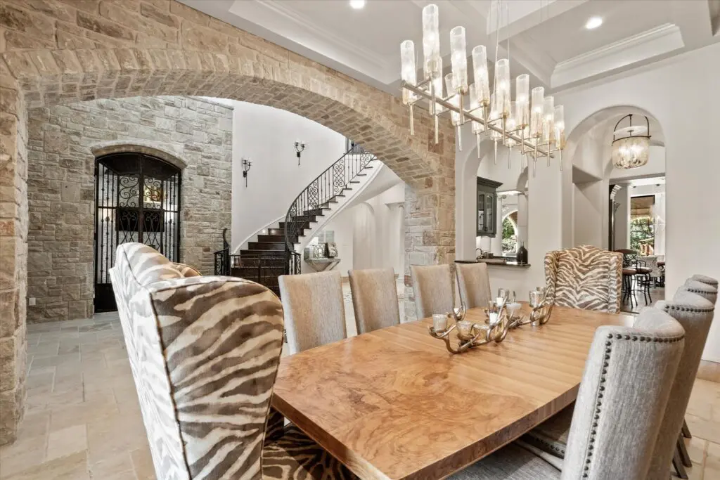 9517 Bella Terra - with its intricate stone flooring and walls transports you to a European destination.
