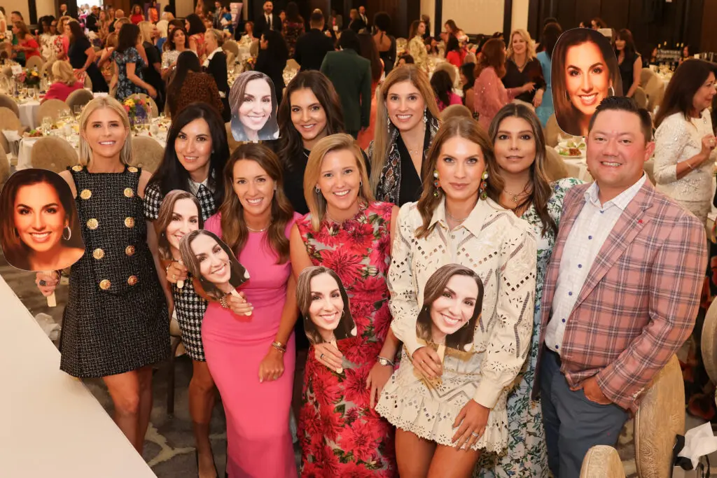 Fans of honoree Julie Longoria Chen join her husband, Stephen Chen, in showing their support at the PaperCity Philanthropy in Fashion Best Dressed luncheon (Photo by Priscilla Dickson)