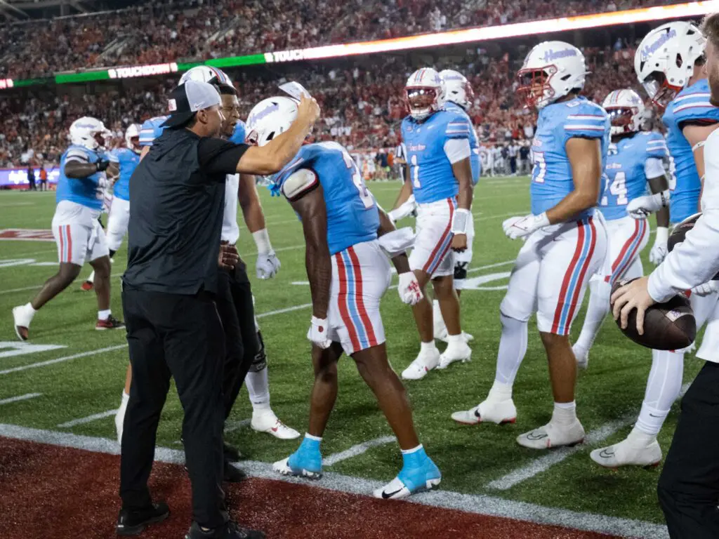 University of Houston receiver Mathew Golden (No. 2) received plenty of love after a key touchdown catch. (Photo by F. Carter Smith)