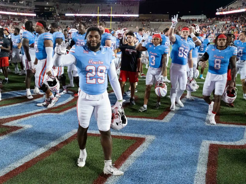 University of Houston's football team celebrated a season opening win. (Photo by F. Carter Smith)
