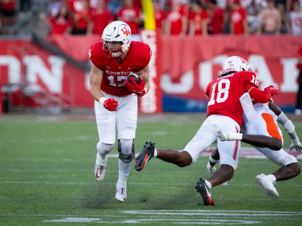 University of Houston tight end Mike O'Laughlin (No. 17) and wide receiver Joshua Cobbs (No. 18) are both good blockers. (Photo by F. Carter Smith)