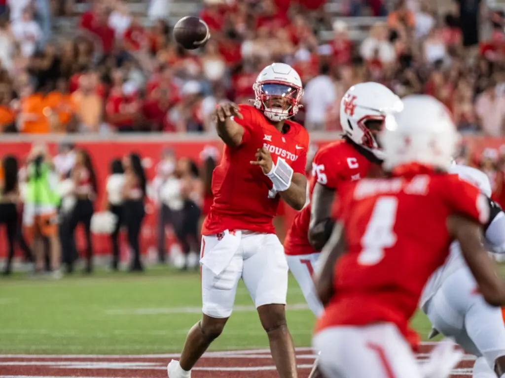 University of Houston quarterback Donovan Smith and receiver Sam Brown (No. 4) have built up quite a connection. (Photo by F. Carter Smith)