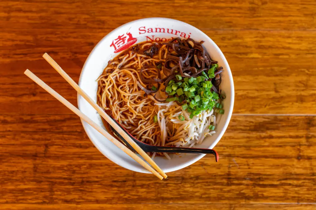 Steaming ramen noodles at the new Samurai Noodle location at the Lyric Market. Photo by Brandon Holmes.