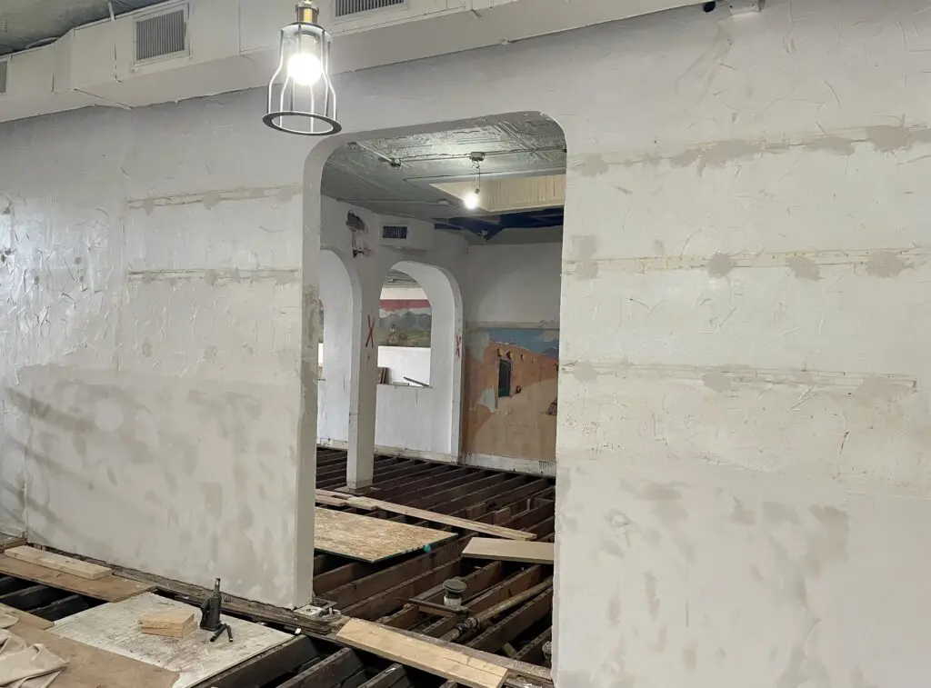 The nearly one hundred year old building had been left largely in disrepair, with rotting wood floors, and plumbing and electrical not up to code. (Photo by Courtney Dabney)