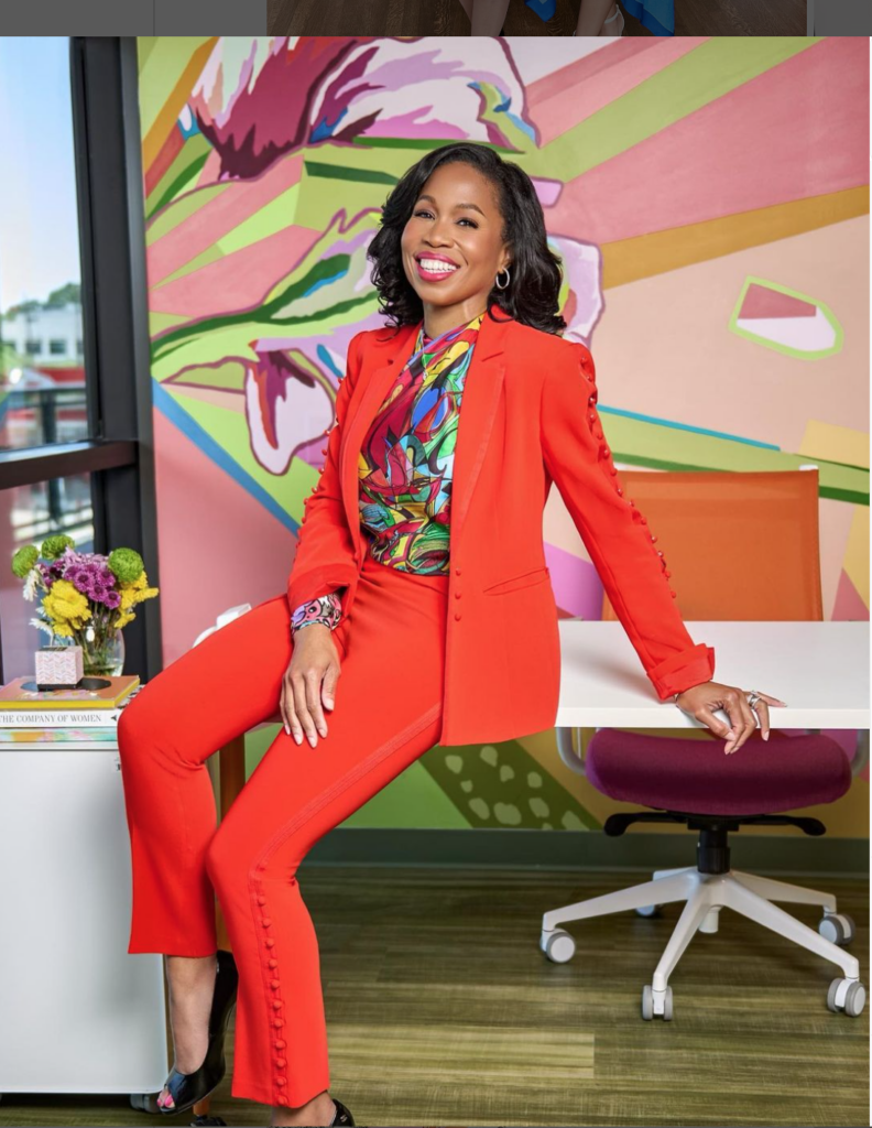Roslyn Bazzelle Mitchell celebrating her new office quarters in SheSpace. (Photo by Moni Pradier)