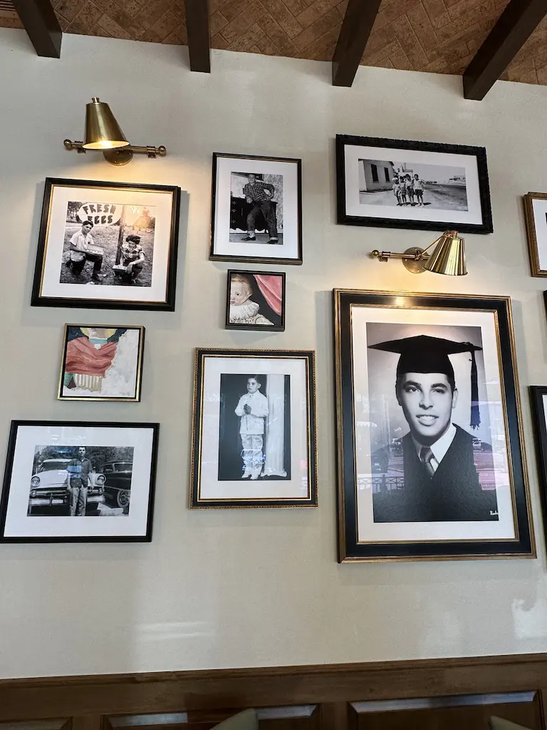 The photo wall salute in the Mr. C. Room honoring Johnny Carrabba Jr., father of the same named restaurateur. (Photo by Shelby Hodge)