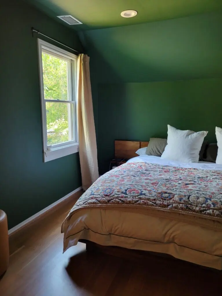 The verdant Beverly coats the walls of our primary bedroom. 