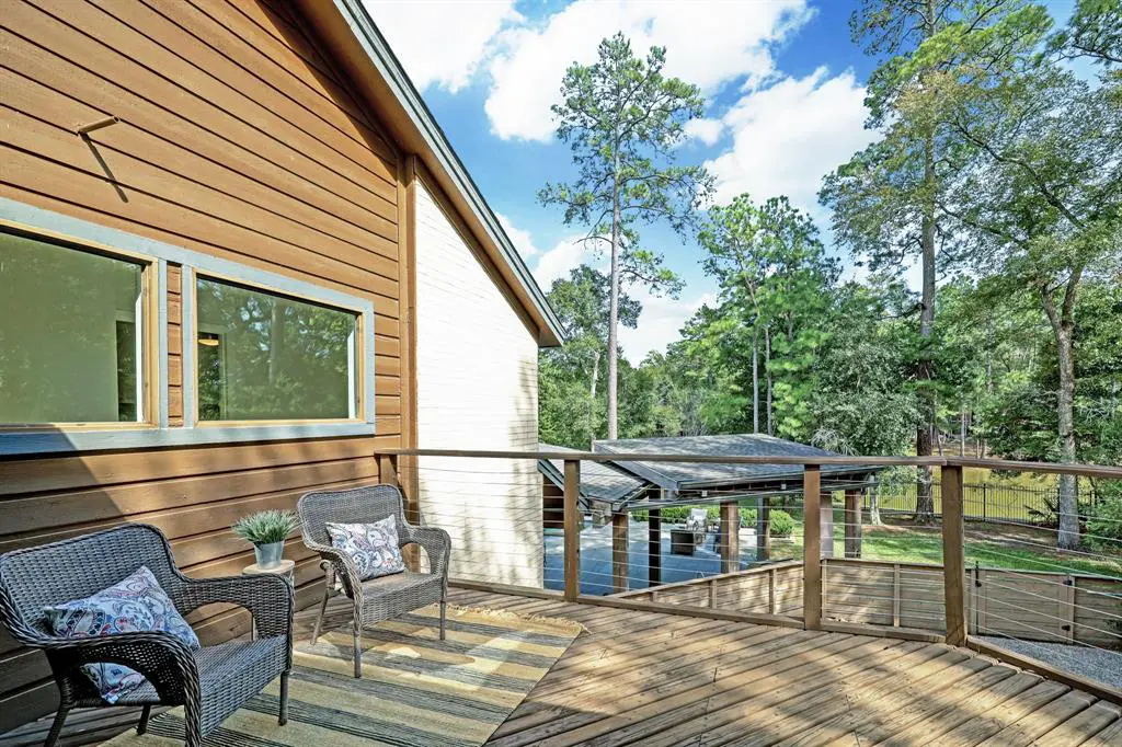The balcony off the game room sits above a custom 5-car garage. (Photo by TK Images)