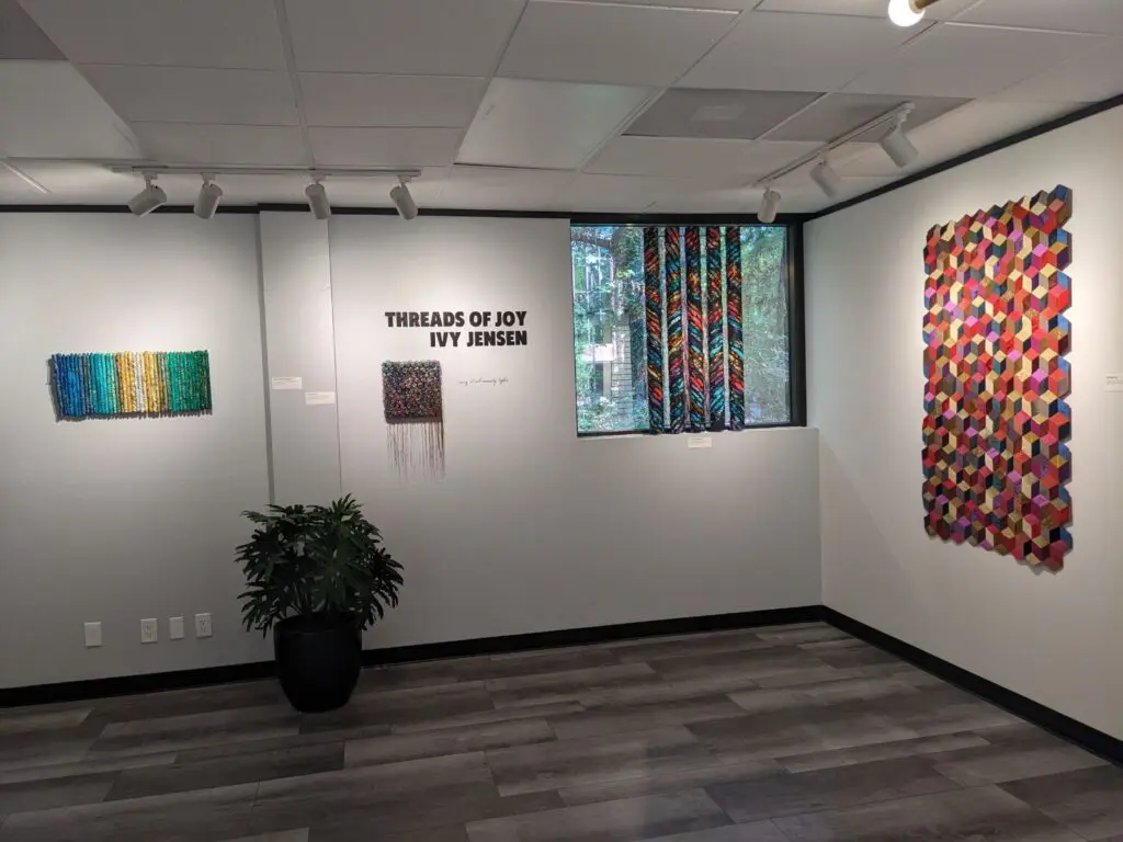The Woodlands Arts Council finally has a headquarters of its own. "Threads of Joy" is the current exhibit in the space at The Woodlands Arts Council's new space. With great natural light, some of the art is shown in windows.
