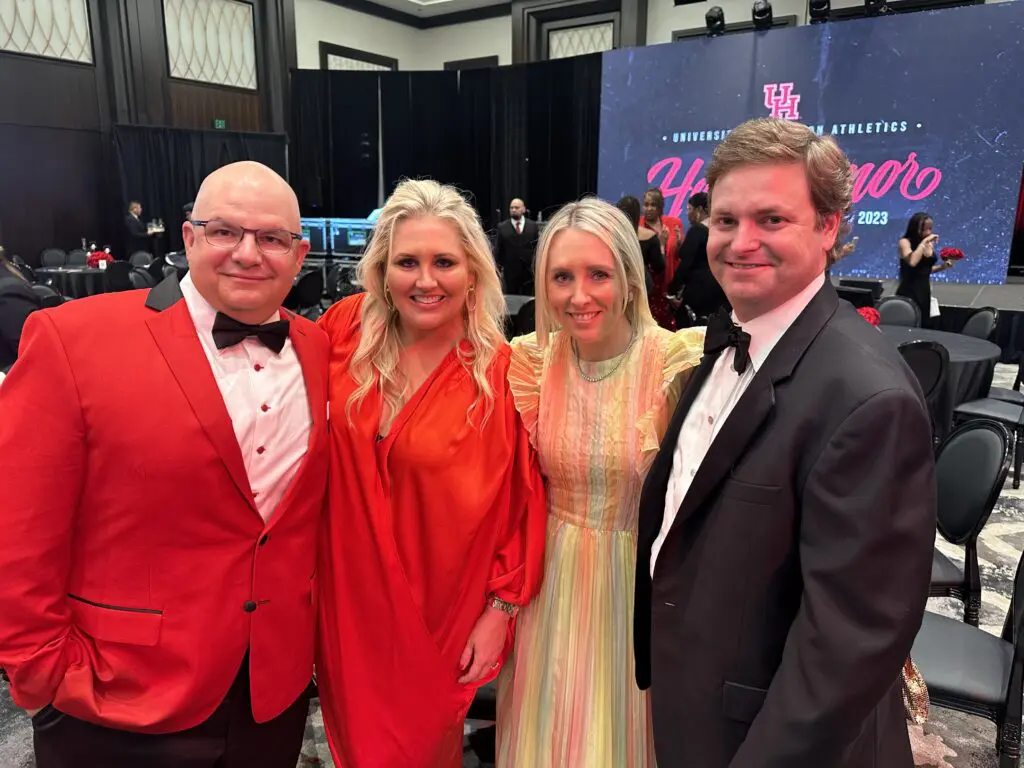 UH Hall of Honor gala chairs Patrick and Meredith Chastang and Liz and David Anders share a moment at the UH Hall of Honor gala.   (Photo by Eddy Matchette/Courtesy UH Athletics)