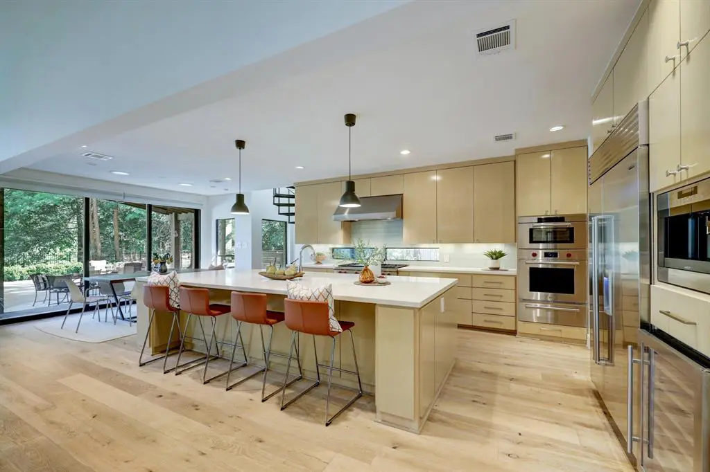 The modern kitchen is the perfect place to cook and socialize with friends and family. (Photo by TK Images)