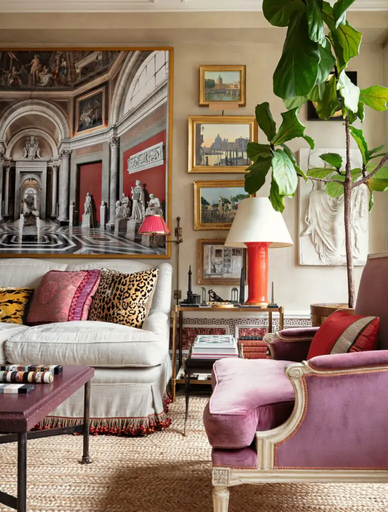 In a living room designed by Alexa Hampton, a Massimo Listri photograph is above the sofa.  (Photo by Steven Freihon)