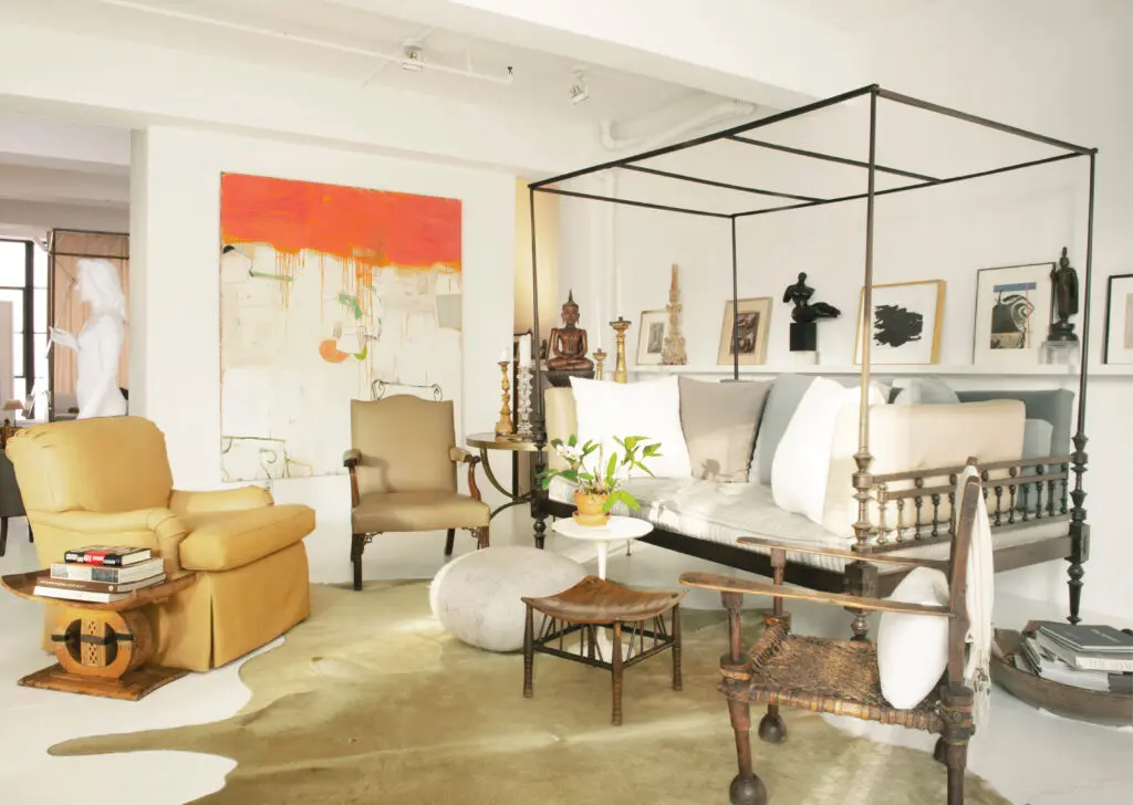 In a living area designed by Vicente Wolf, 
a painting by Gary Komarin; chair in the foreground is a 19th-century Ethiopian chieftain’s chair. (Photo by Vicente Wolf) 