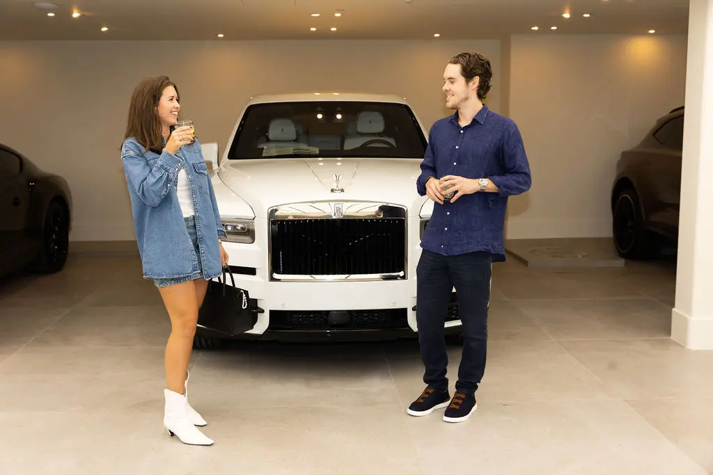 As guests made their way to the basement garage, they were treated to a chic car show with Bentley Dallas outfitting the space with a selection from its fantastic fleet. (Photo by Kaitlin Saragusa)