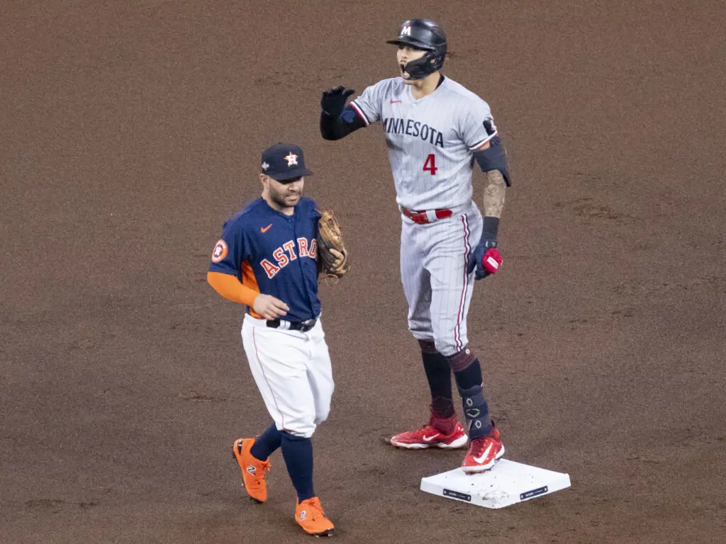 Carlos Correa is looming large in this playoff series between the Twins and the Astros. And Jose Altuve can't like what he sees. (Photo by F. Carter Smith) 