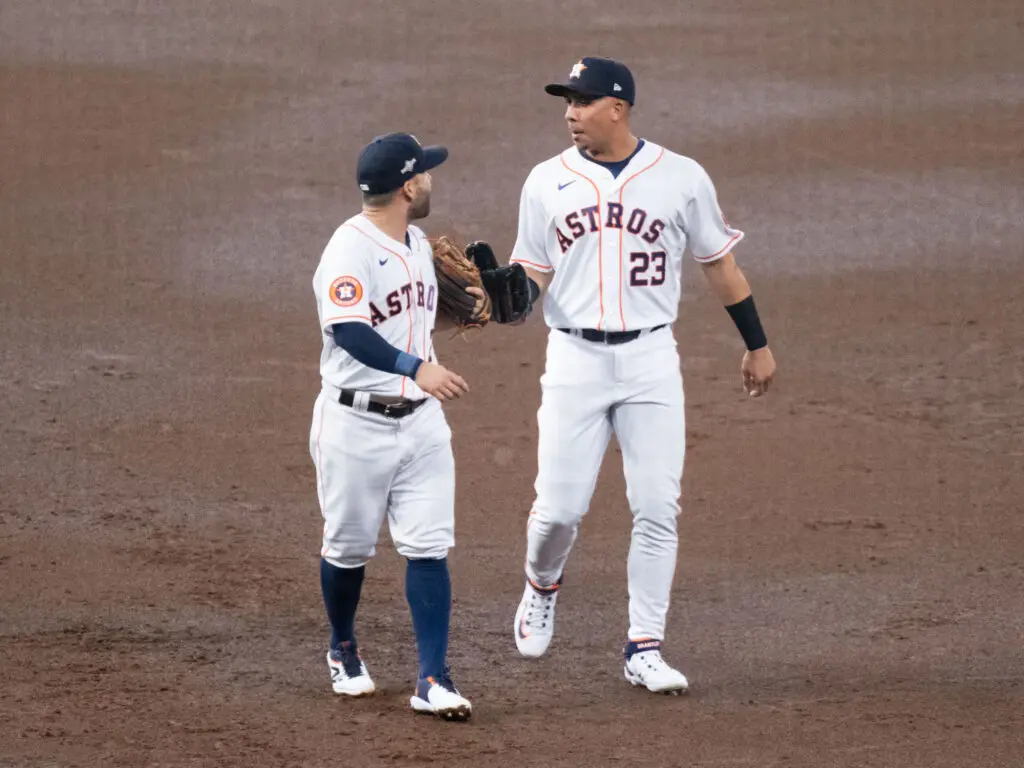 Jose Altuve and Michael Brantley know there is nothing sweeter than winning together. (Photo by F. Carter Smith)