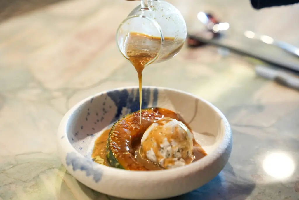 Chef Man ends his 9-course omakase at Kanpai Club Saturdays at lunch with dessert. In this case, a kabocha squash that is brûlée with black sesame ice cream and a sesame caramel sauce.