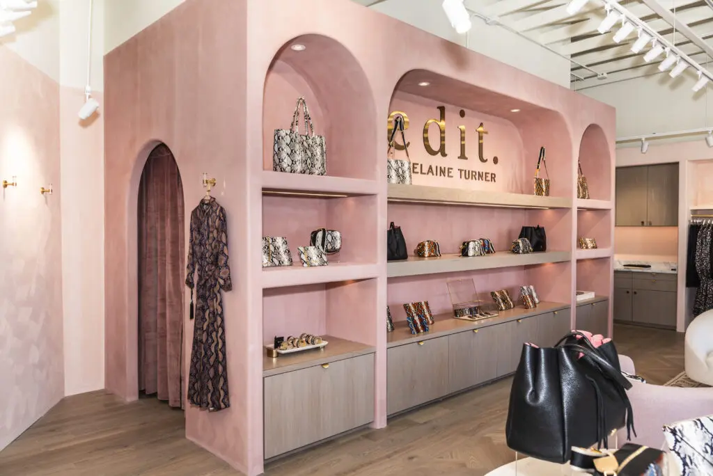 Arches add additional softness to the structure of the new Elaine Turner store's space. (Photo by Toman Imagery)