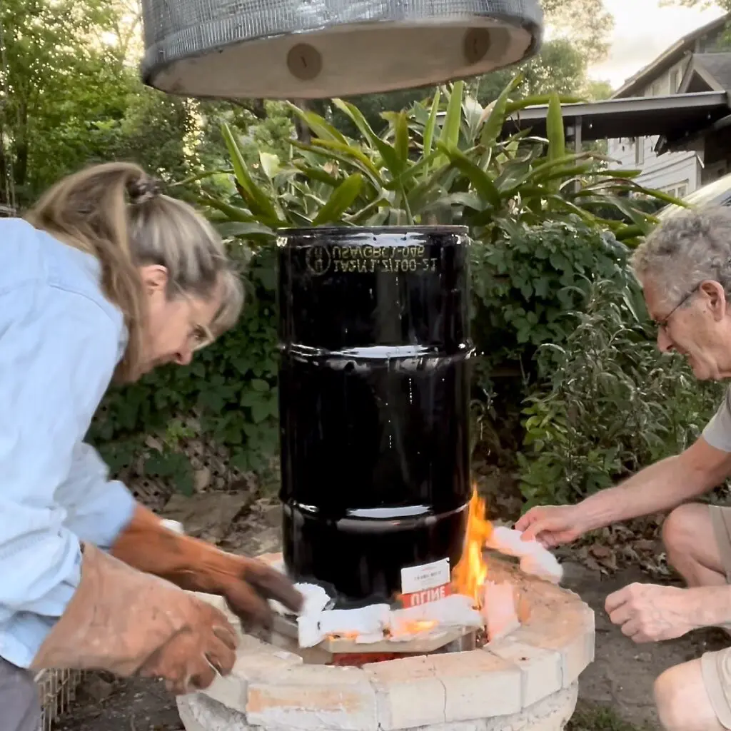 Artists and pottery instructors Judy Adams and John Foelber work near their kiln at Foelber Pottery Gallery and Studios. (Courtesy Foelber Pottery Gallery and Studios)