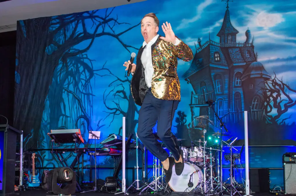 Auctioneer Jumpin' Johnny Bravo at the Ronald McDonald House Houston Boo Ball (Photo by Jacob Power)