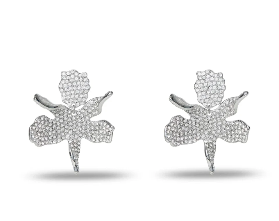 Lele Sadoughi offers fun pieces that can make any outfit — like these dazzling signature earrings.  