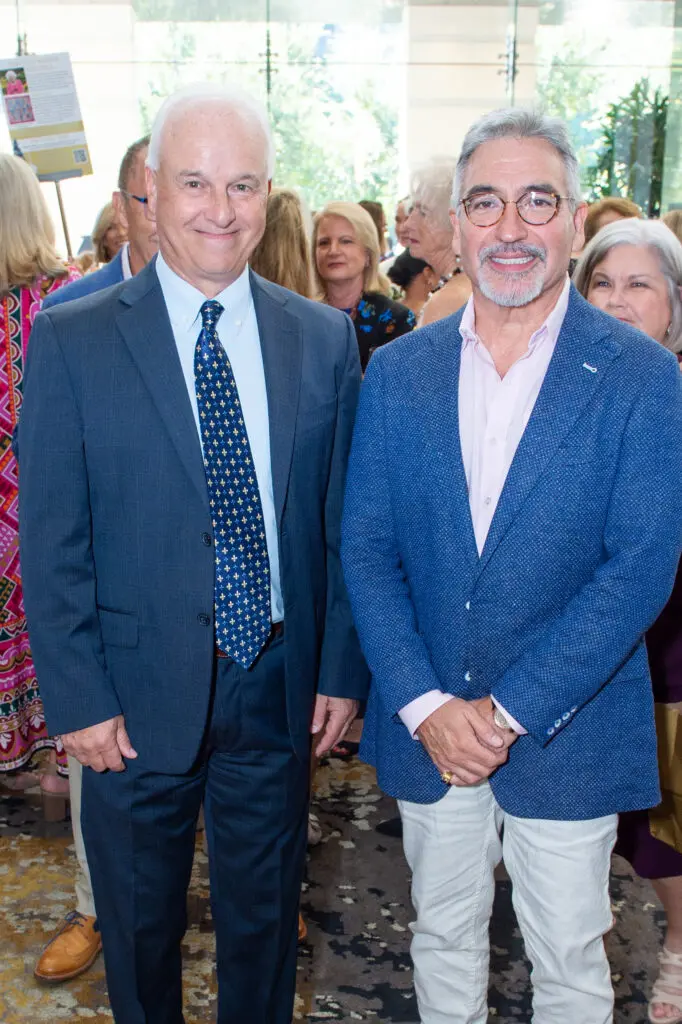 Mark Jakel, Ernest Trevino at the Barbara Bush Houston Literacy Foundation Power of Literacy Luncheon. (Photo by Jacob Power)