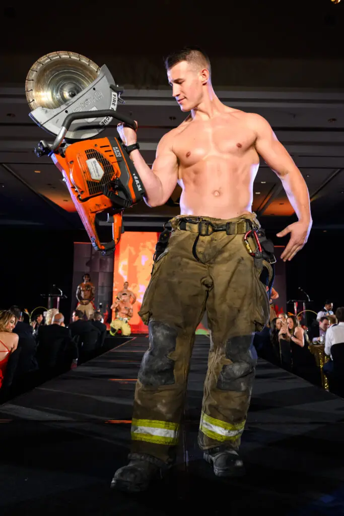 Houston Firefighter Calendar model Mr. September struts his stuff at the 'Red Hot Gala' benefitting the Houston Firefighters Foundation at the Royal Sonesta Hotel. (Photo by Michelle Watson)