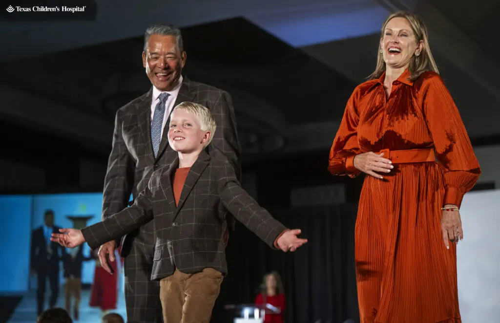 Honorees Frank & Stephanie Tsuru escort Patient Champion Landon at the 12th annual fundraiser for Texas Children's Cancer and Hematology Center.  (Photo by Texas Children's Hospital)