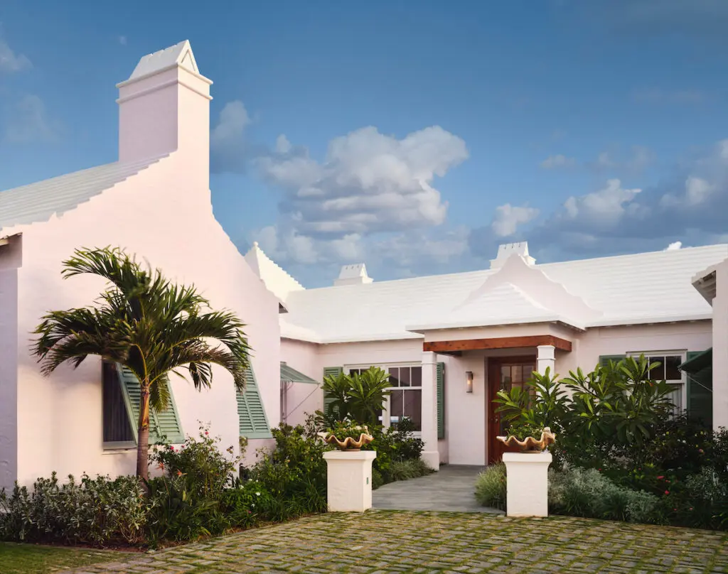 The pink-sand beaches inspired the island home's rosy-hued exterior.  (Photo by Douglas Friedman)